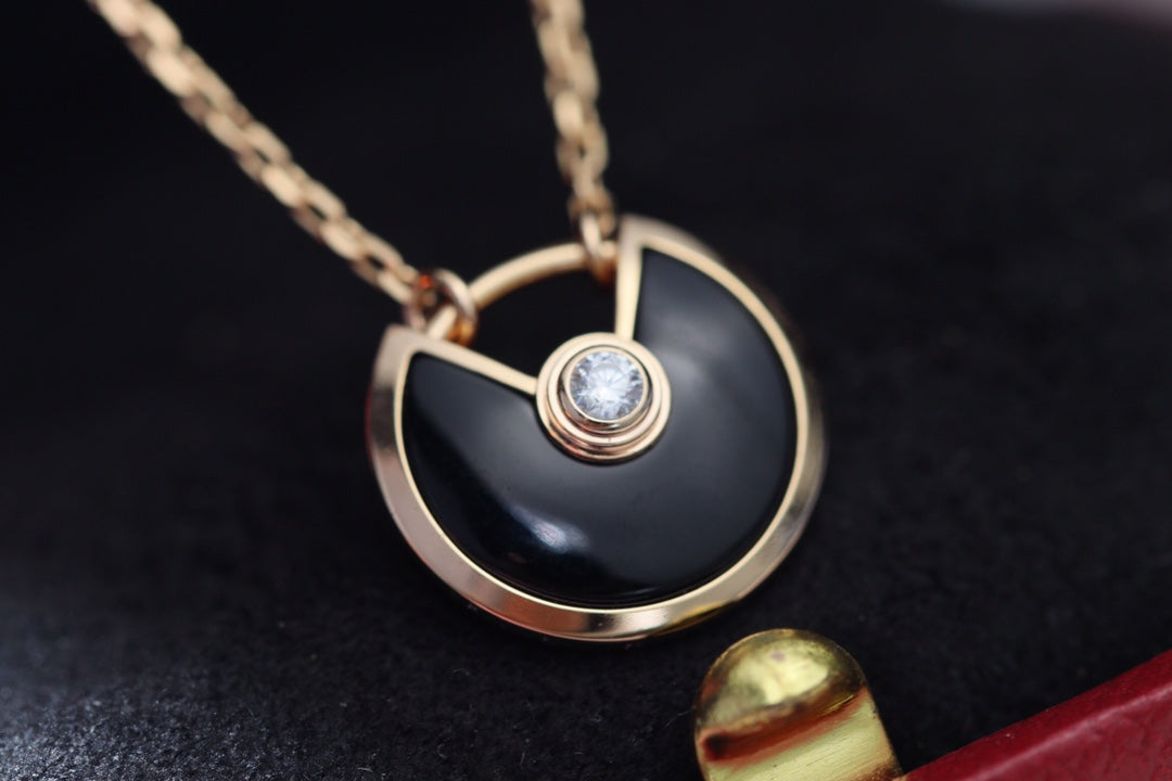 CARTIER AMULETTE NECKLACE