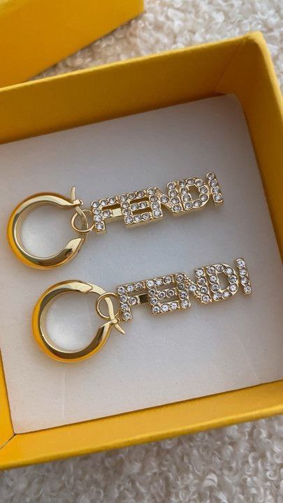 Boucles d'oreilles doré FENDI strass