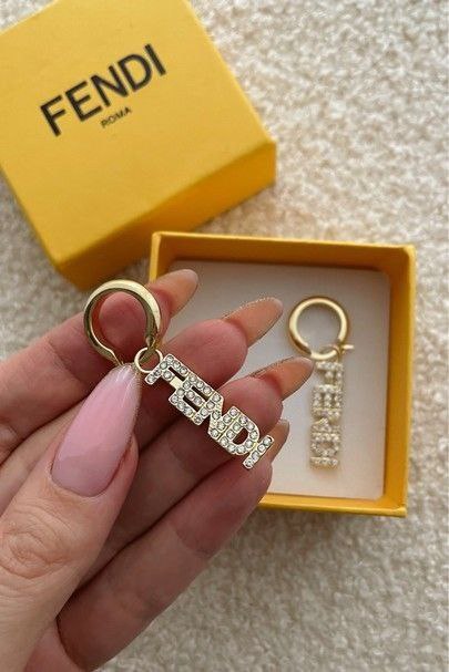 Boucles d'oreilles doré FENDI strass